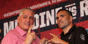 Gatto appears with boxer Anthony Mundine at a promotional event in 2014.