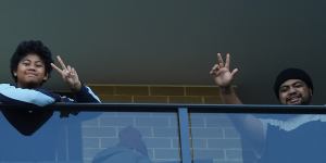 Residents on their balcony at Warby Street,Campbelltown. 