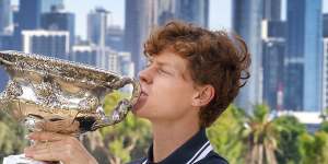 Jannik Sinner with the spoils of victory - the Norman Brookes Challenge Cup - after his win in Sunday’s men’s singles final at the Australian Open. 