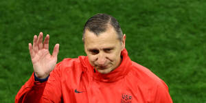 US coach Vlatko Andonovski waves after being knocked out of the World Cup.