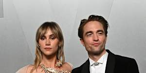 Suki Waterhouse and Robert Pattinson arrive at the Vanity Fair Oscar Party.
