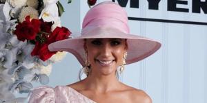Myer ambassador Rachael Finch wears Nicola Finetti dress and Melissa Jackson hat at the Myer marquee on Oaks Day 2018.