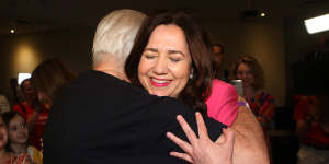 Annastacia Palaszczuk shares a hug with her father,former Labor minister Henry Palaszczuk,after winning her third term as Queensland premier.