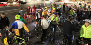 Cyclists protesting the state government's plans to rip up a cycleway on College Street.