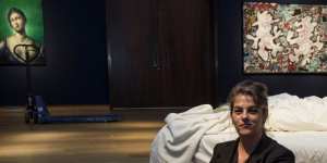 Tracey Emin sits near her iconic art installation,My Bed,which was short-listed for the 1999 Turner Prize. 