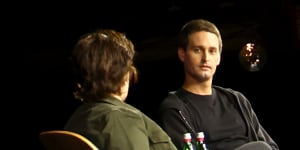 Snap chief executive Evan Spiegel is interviewed on stage at the company’s April 2023 conference where it announced its AI chatbot would be free for all users.