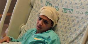Thirteen-year-old Ahmed Manasra,who reportedly commited a stabbing attack in Pisgat Ze'ev in Jerusalem,is seen after treatment at the Hadassah Medical Centre in Jerusalem. 