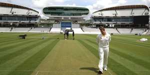 Steve Smith inspects the Lord’s pitch.