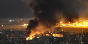 Flames and smoke rise from an Israeli airstrike on Dahiyeh,in the southern suburb of Beirut,Lebanon.