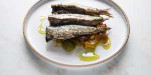 Meaty sardines are plated with a sweet agrodolce,pine nuts and green olives.