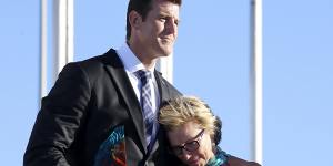 Rosie Batty,having just been announced as 2015 Australian of the Year,with Ben Roberts-Smith,then Chair of the National Australia Day Council.