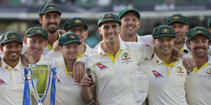 Pat Cummins and the Australian team are all smiles after retaining the Ashes,despite losing the final test at the Oval.