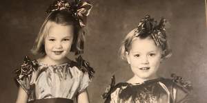 Tamsin (at right,aged 4) with her older sister,Tess.