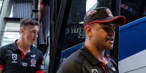 Latrell Mitchell and Jack Wighton leave the Indigenous All Stars team bus together.