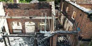 The burnt-out remains of The Crooked House pub near Dudley before its unauthorised demolition.