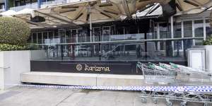 Police at the scene of Karizma Restaurant in Docklands which was targeted in a suspected arson attack overnight.