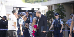 Property developer stabbed to death on Sydney building site,son critically injured