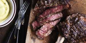 Grilled aged rib-eye with Bearnaise sauce.