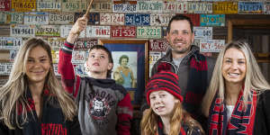 Melbourne legend Robbie Flower’s family - daughter Mikala,grandson Jett 12,granddaughter Ava 8,son Brad and daughter Emily Flower - are looking forward to seeing the Demons play in the grand final. 