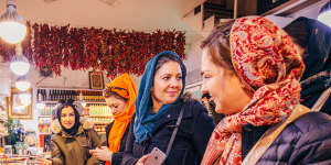 Shopping at a local market in Tehran on one of Intrepid’s women-only tours of Iran.