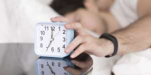 The snooze alarm clock can affect your and your partner’s sleep.