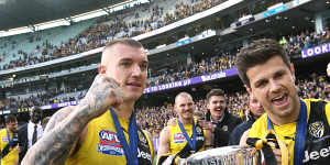 Trent Cotchin (right) and Dustin Martin with the 2017 premiership cup.