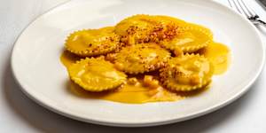 Spanner crab ravioli with pumpkin bisque.