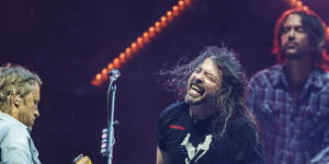 Dave Grohl (centre),guitarist Chris Shiflett and Rami Jaffee on keyboards revel in the sold-out show in Geelong.