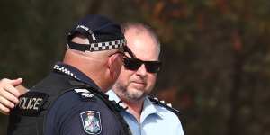 Police work near the scene of the shooting in Wieambilla.