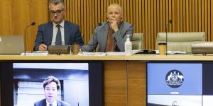 Former AFL CEO Gillon McLachlan,bottom left,and NRL CEO Andrew Abdo appearing before the online gambling inquiry chaired by the late Labor MP Peta Murphy.