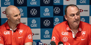 Sydney coach John Longmire,right,and Swans CEO Tom Harley,left,announced Franklin’s retirement.