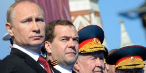 Russian President Vladimir Putin,left,and Prime Minister Dmitry Medvedev attend a Victory Day military parade in Red Square.