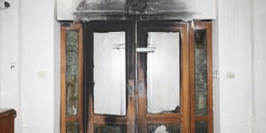 Old Parliament House’s front doors,which date from 1927,were damaged in a fire and protest last week.