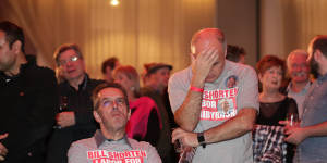 Labor supporters can't hide their disappointment as results come in on Saturday night. 