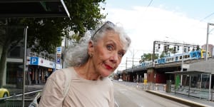 Cheryl O’Brien waits for a tourist tram in the city on Thursday.