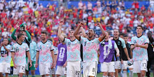 Belgium celebrate victory in Seattle.