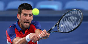 TOKYO,JAPAN - JULY 30:Novak Djokovic of Team Serbia plays a backhand during his Men's Singles Semifinal match against Alexander Zverev of Team Germany on day seven of the Tokyo 2020 Olympic Games at Ariake Tennis Park on July 30,2021 in Tokyo,Japan. (Photo by Clive Brunskill/Getty Images)