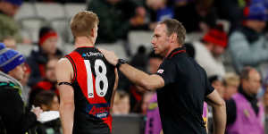 Bombers coach Ben Rutten and Michael Hurley.