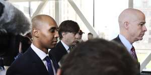 Former Minneapolis police officer Mohamed Noor (centre) is flanked by lawyers Peter Wold and Thomas Plunkett (right) as he enters court on Tuesday. 