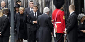 Emmanuel and Brigitte Macron arrive at Westminster Abbey.