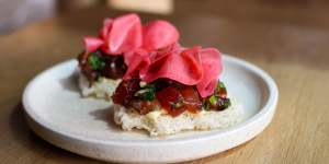 Yellowfin tuna with fried rice noodle and watermelon radish.