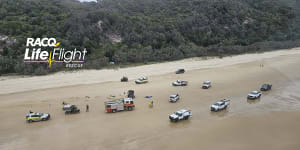 Emergency services at the site of a fatal rollover on Teewah Beach,Cooloola.