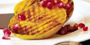 Barbecued mango cheeks with pomegranates
