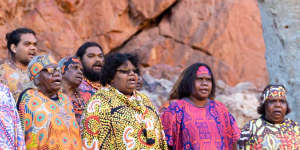 Members of the Central Australian Aboriginal choir,pictured last year,will sing a new version of the anthem on Sunday. It replaces the word"young"with the word"one"and adds a new verse that recognises 60,000 years of continued existence by Aboriginal Australians. 