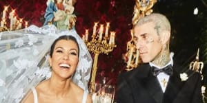 Kourtney Kardashian and Travis Barker wearing Dolce&Gabbana at their Italian wedding.