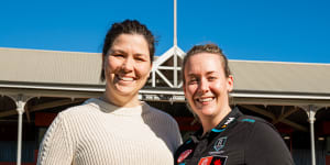 Port Adelaide AFLW senior coach Lauren Arnell (right) and partner Lexi Edwards.