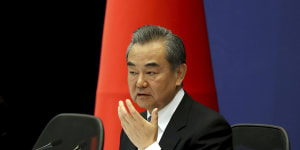 Chinese Foreign Minister Wang Yi at the announcement.