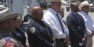 Uvalde School Police Chief Pete Arredondo,third from left,stands during a news conference outside of the Robb Elementary school in Uvalde,Texas on May 26.