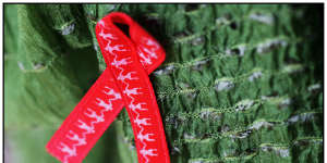 The red ribbon has been the symbol for AIDS-HIV support for decades.
