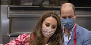 The royal couple making bagels in a London bakery last September.